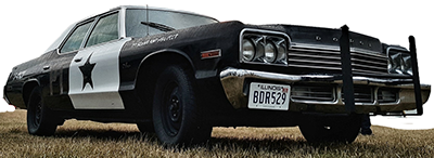 This is an image of a 1974 Dodge Monaco Sedan, an exact replica of 'The Bluesmobile' featured in the movie The Blues Brothers.